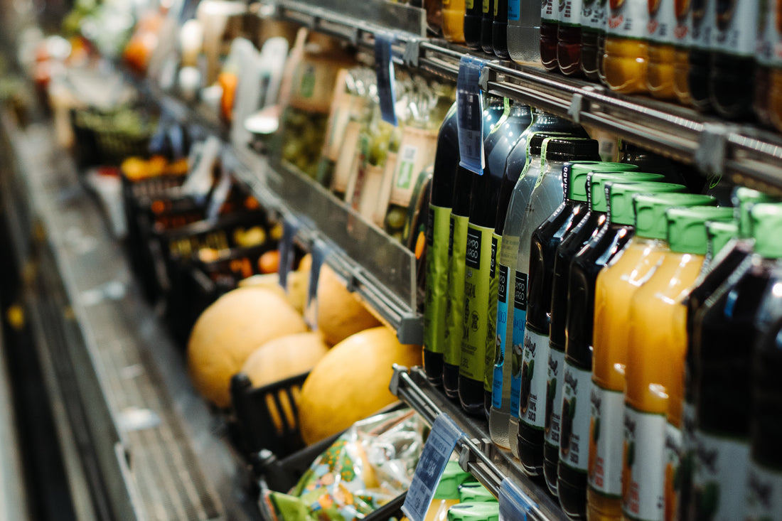 Woman shopping in the dairy refrigerator