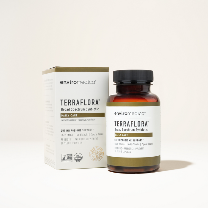 Terraflora Daily Care bottle on neutral background — spore-based synbiotic designed to rewild the gut, restore microbial diversity, and nurture native flora.